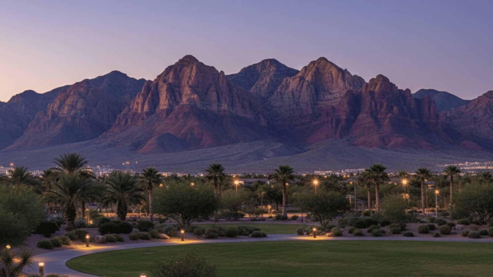 Aerial view of master-planned Las Vegas Valley neighborhoods contrasting Summerlin's red-rock backdrop against Henderson's desert floor — Summerlin vs Henderson 2026