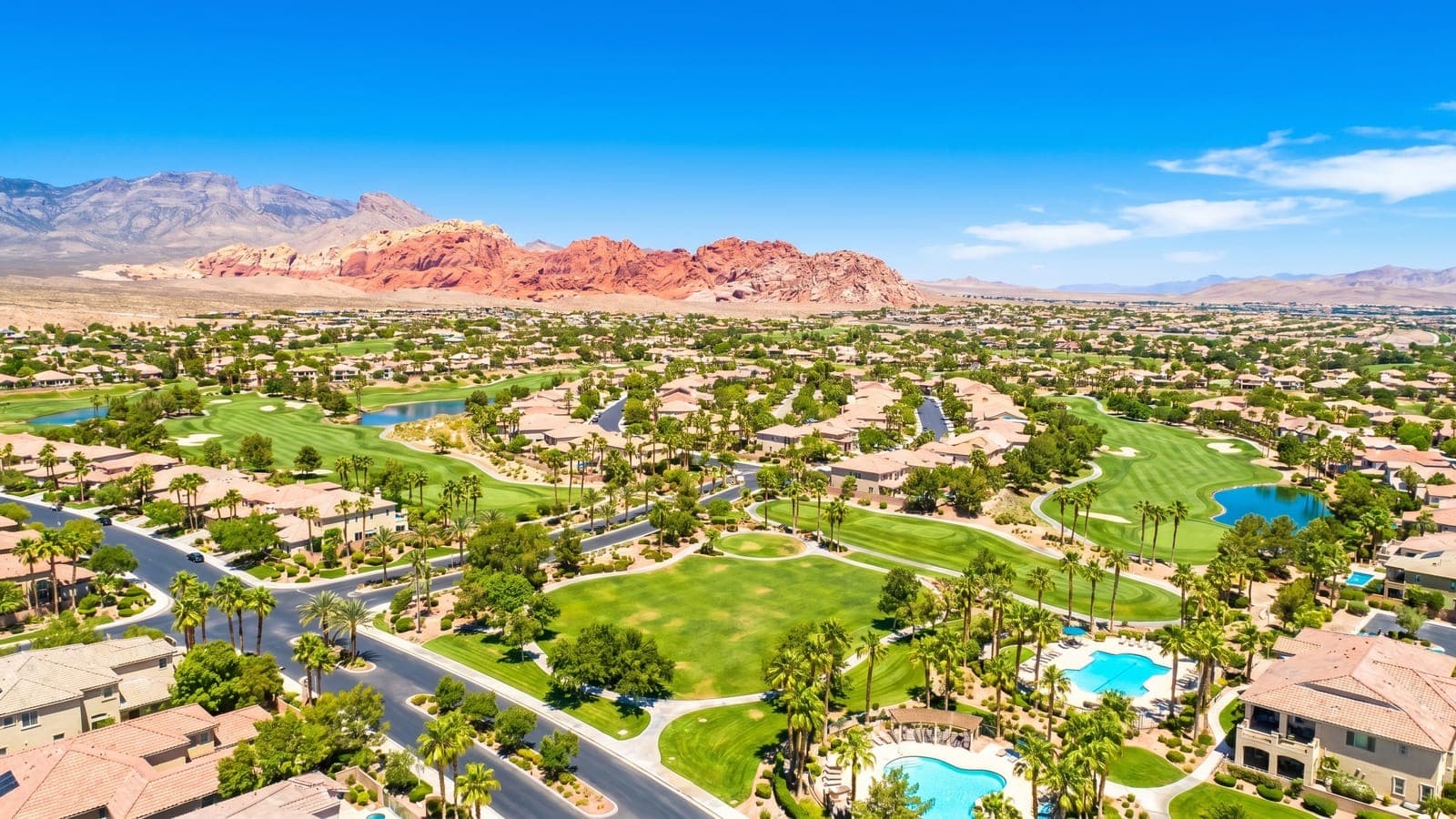 Summerlin, Las Vegas master-planned village against the Red Rock Canyon escarpment at golden hour
