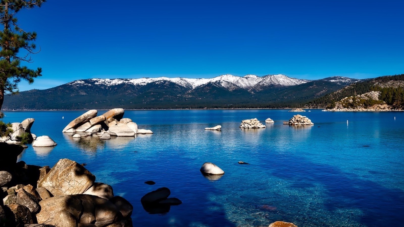 Alpine water and Sierra Nevada peaks at Lake Tahoe on the Nevada side, the setting for waterfront real estate
